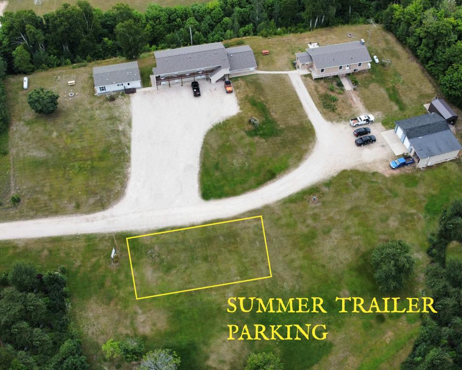 Overhead view of the summer parking lot at Voyageurs Hotel