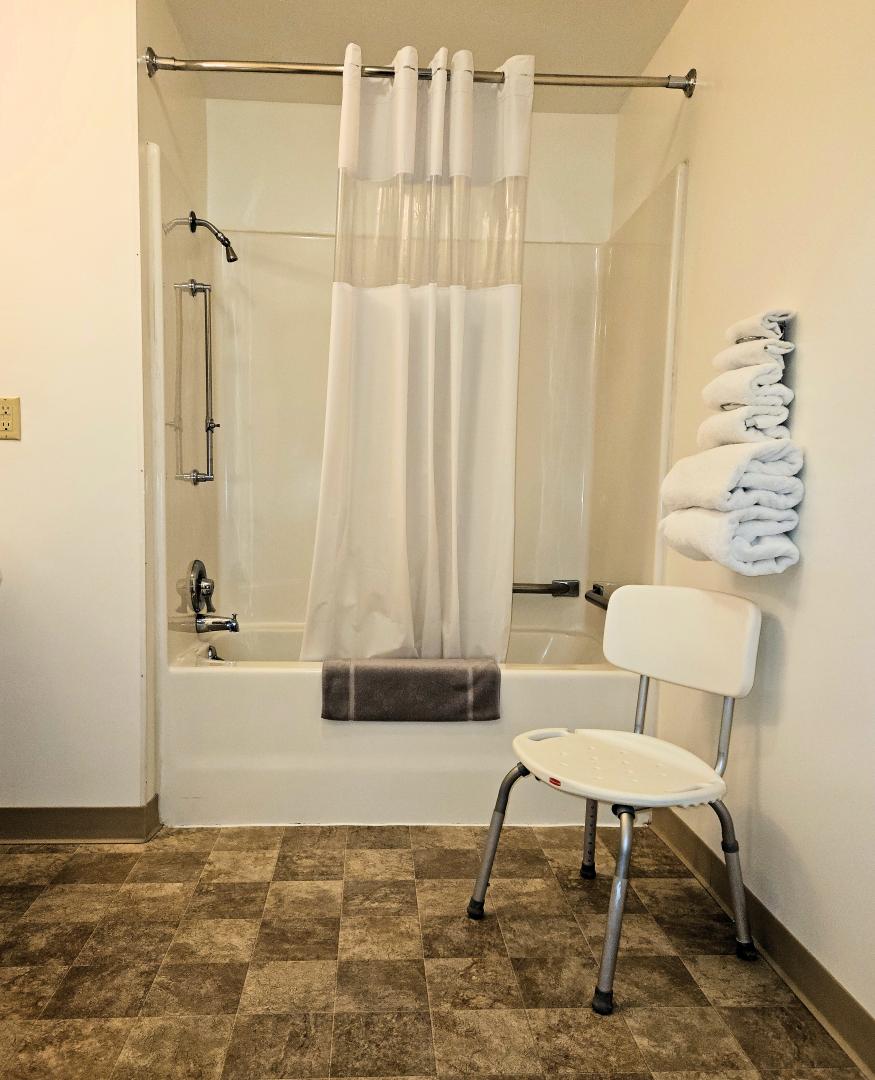Shower and bathtub in ADA compliant room